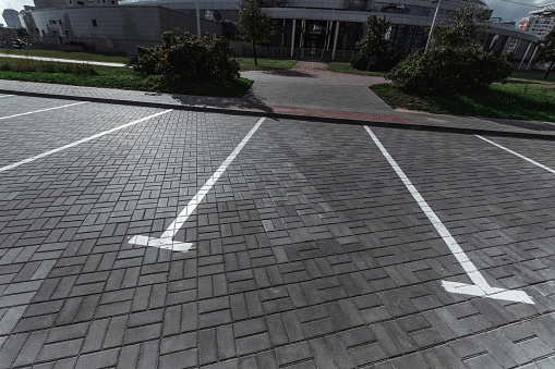 Parking, marking on the asphalt parking spaces. The concept of a lack of parking in megacities, paid parking