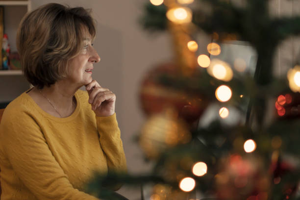 istock Senior woman using computer in the night  et home 1091488818