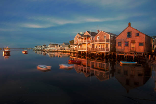 harbor houses in quiet and calm sunset in nantucket island - lighthouse massachusetts beach coastline imagens e fotografias de stock