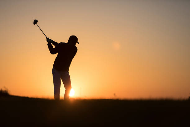 istock Golf player shoting ball -  Links Golf - Sunset Time 1091495132