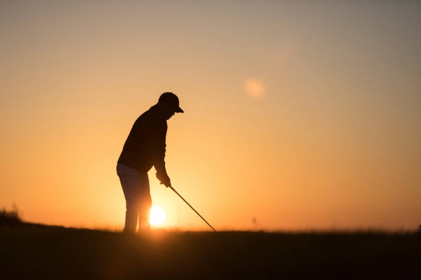 istock Golf player shoting ball -  Links Golf - Sunset Time 1091495204