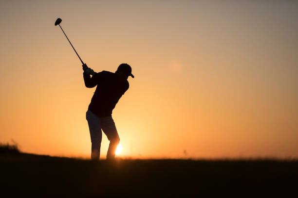 istock Golf player shoting ball -  Links Golf - Sunset Time 1091496494