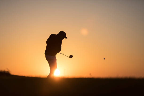 istock Golf player shoting ball -  Links Golf - Sunset Time 1091496626