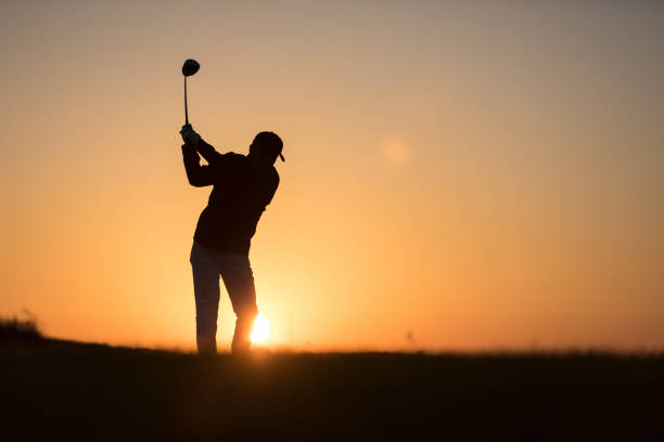 istock Golf player shoting ball -  Links Golf - Sunset Time 1091496628