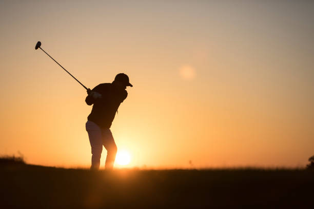 istock Golf player shoting ball -  Links Golf - Sunset Time 1091497066