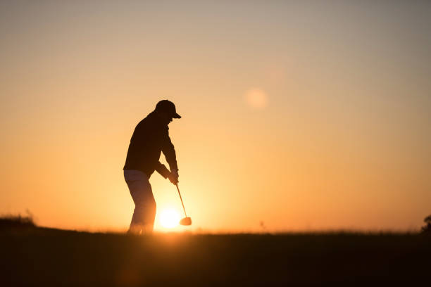 istock Golf player shoting ball -  Links Golf - Sunset Time 1091498418