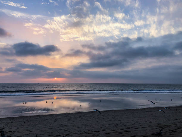 istock Sun sets over Venice Beach, CA with moody sky 1091498572