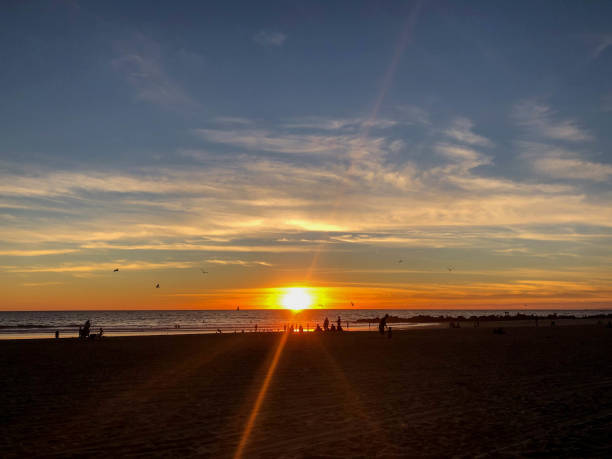 istock Sun sets over Venice Beach, CA with moody sky at Pride Lifeguard tower 1091498812