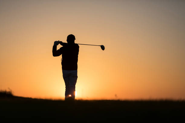 istock Golf player shoting ball -  Links Golf - Sunset Time 1091499026