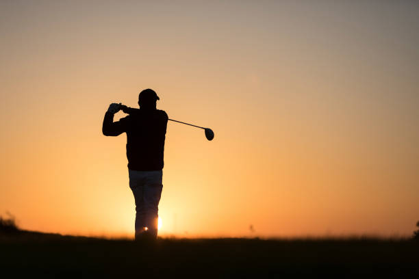 istock Golf player shoting ball -  Links Golf - Sunset Time 1091499226