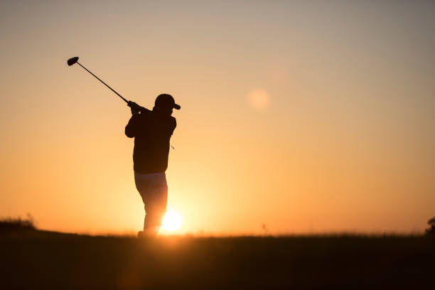 istock Golf player shoting ball -  Links Golf - Sunset Time 1091499378