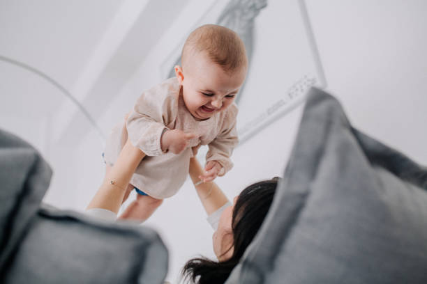 istock Mother cuddling with her baby daughter 1091499614