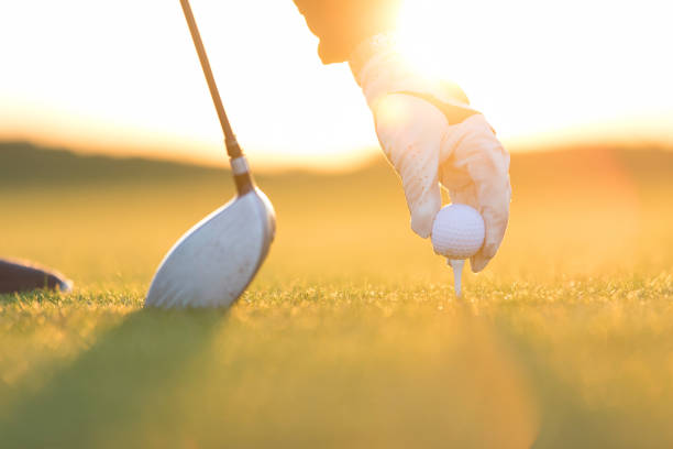 Golf player shoting ball -  Links Golf - Sunset Time