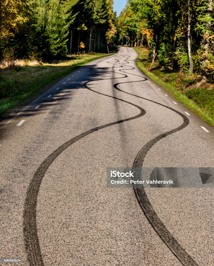 Skid marks Skid marks in wave pattern on a small country road Brake Stock Photo
