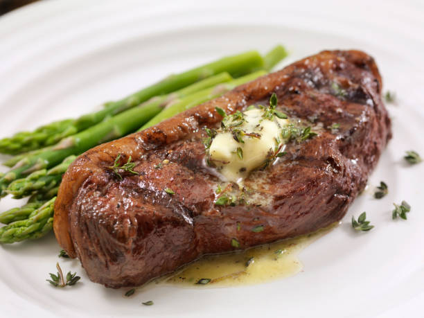 istock Medium Rare Top Sirloin Steak with Herb Garlic Butter 1091514178