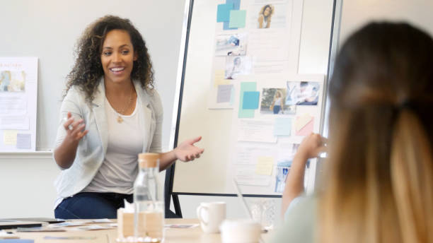 istock Confident businesswoman gives presentation 1091518744