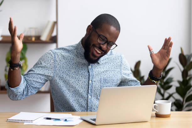 istock Joyful black businessman talking with friend make video call 1091526886