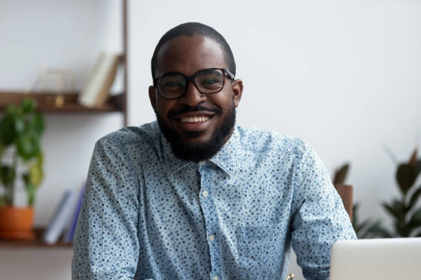 istock Smiling entrepreneur looking at camera posing in workplace 1091526926