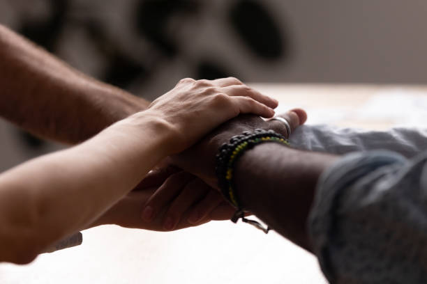 istock Diverse male and female stacked their hands together 1091527064