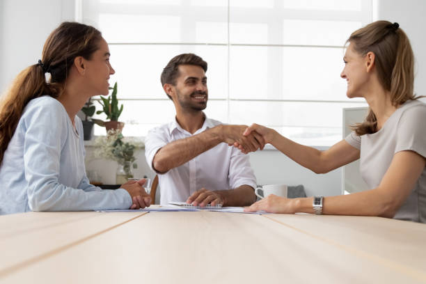 istock Business partners shaking hands greeting each other 1091527130