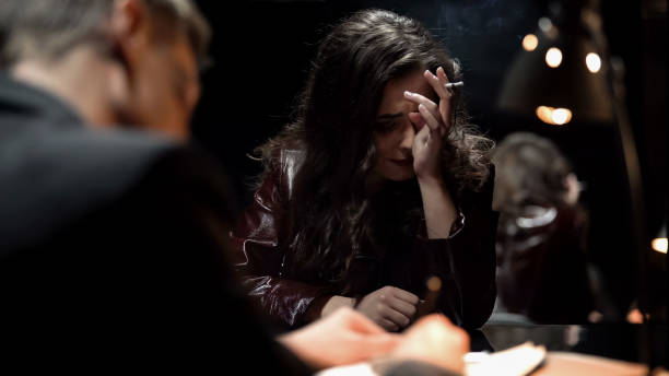 istock Desperate lady crying after finding out about husbands murder, writing testimony 1091530640