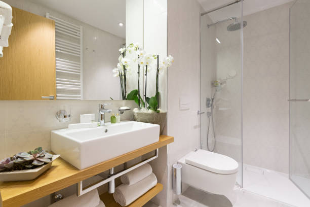 Stylish bathtub in cozy residential bathroom