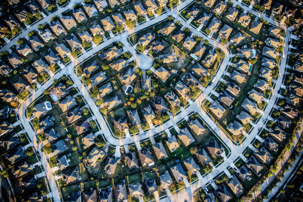 Suburban Master Planned Community Aerial Aerial view of a residential subdivision in the suburbs of Houston, Texas consisting of large luxury homes and manicured landscaping. land planning stock pictures, royalty-free photos & images