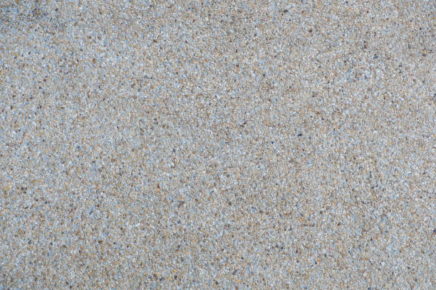 istock Explsed aggregate finish concrete wall and floor background texture. 1091534894