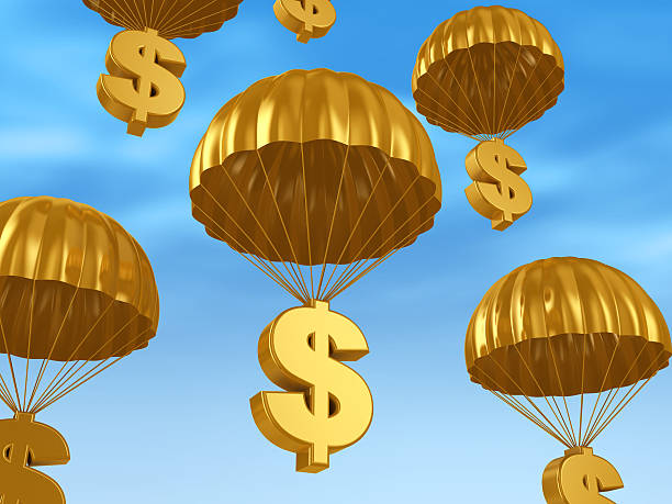 cash parachute stock photo