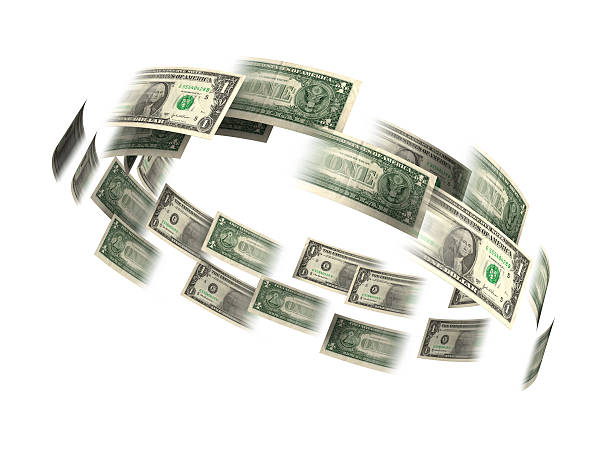 Dollar bills flying in a circle stock photo