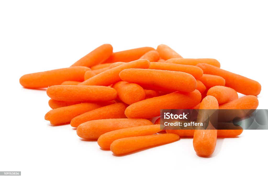 Peladas baby carrots - Foto de stock de zanahoria mini libre de derechos