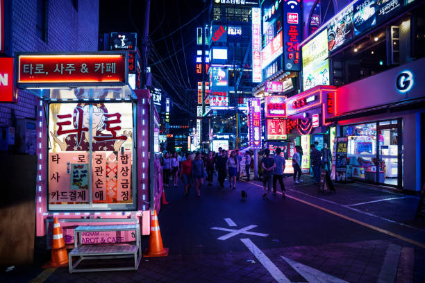 Gangnam shopping street with colorful neon lights at night, Seoul, South Korea Seoul, South Korea - September 8 2017: Gangnam shopping street with colorful neon lights at night kangnamgu stock pictures, royalty-free photos & images