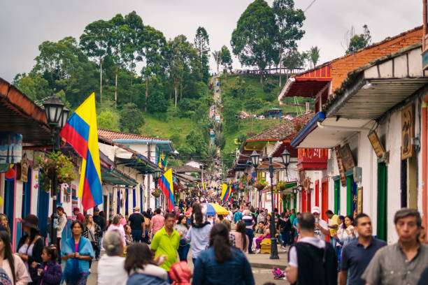 Salento, Quindio / Colombia - 06 30 2018: People walking in the Streets of Salento