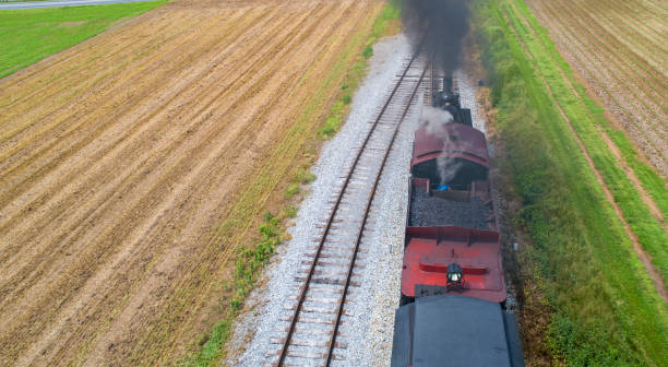 istock Ariel View of a Steam Passenger Train Pulling into Picnic Area 1091554544