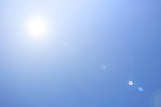 istock flare effect and deep blue sky nature background 1091554644
