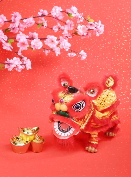 istock chinese traditional dancing lion with ingot 1091555746