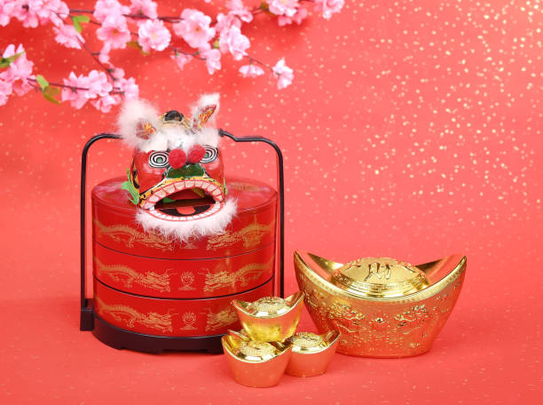 istock chinese traditional dancing lion with ingot 1091555762