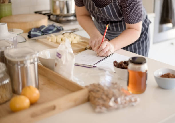 Female preparing a new recipe.