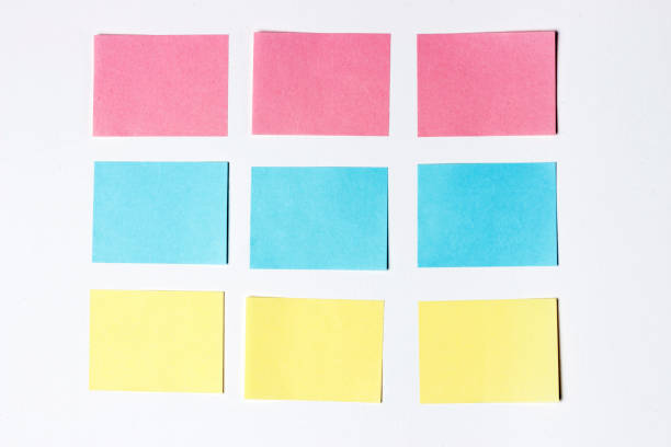 istock Mock-up of many empty multicolored office stickers on a wooden background. Copy space, space for text. Office concept 1091556074