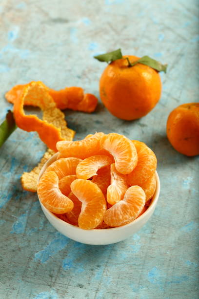 Bowl of fresh orange fruit salad.