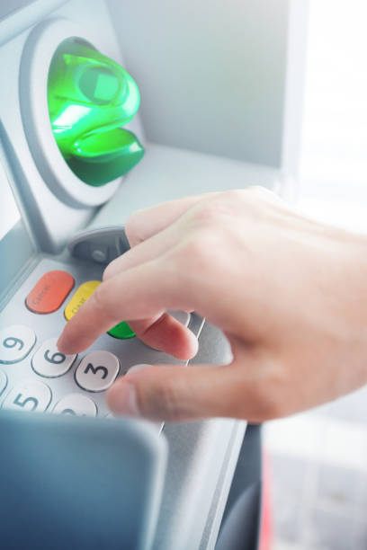 istock Hand Keying In Password from ATM Machine 1091571696