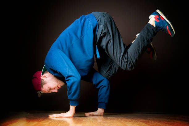 istock the process of doing freeze by young dancer in dark studio b 1091574052