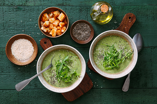 Vegetarian creamy spinach soup with chia seed and arugula