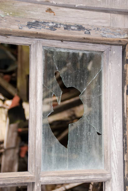 istock Close-Up of a broken out window 1091586996