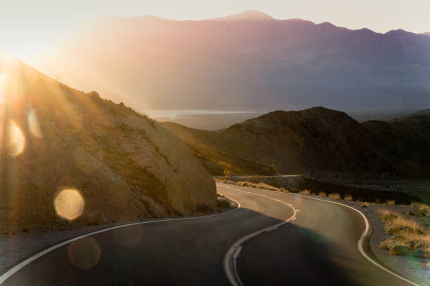 istock Highway at sunrise, going into Death Valley National Park 1091590774