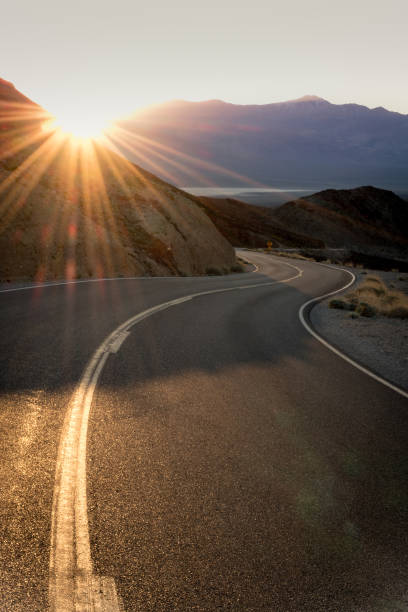 istock Highway at sunrise, going into Death Valley National Park 1091590796