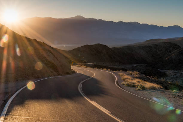 istock Highway at sunrise, going into Death Valley National Park 1091590922