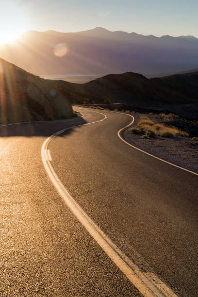 istock Highway at sunrise, going into Death Valley National Park 1091591028