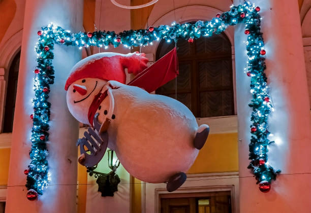 istock merry Christmas snowman winter night 1091592642