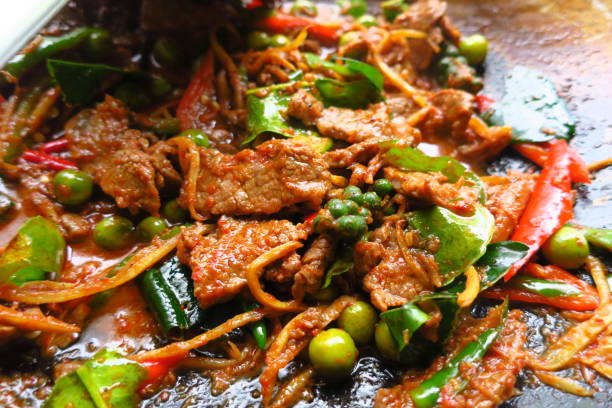 istock fried red curry beef hot and spicy thai style food 1091601838